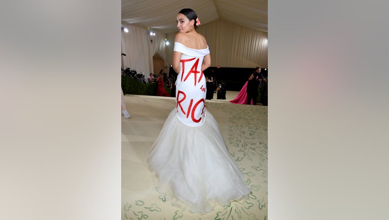 BREAKING: AOC Wears “Tax the Rich” Dress to Exclusive Gala at the Met!
